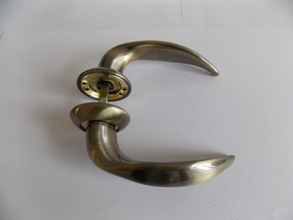 Ручка дверная Армадилло TAURUS - бронза+никель
